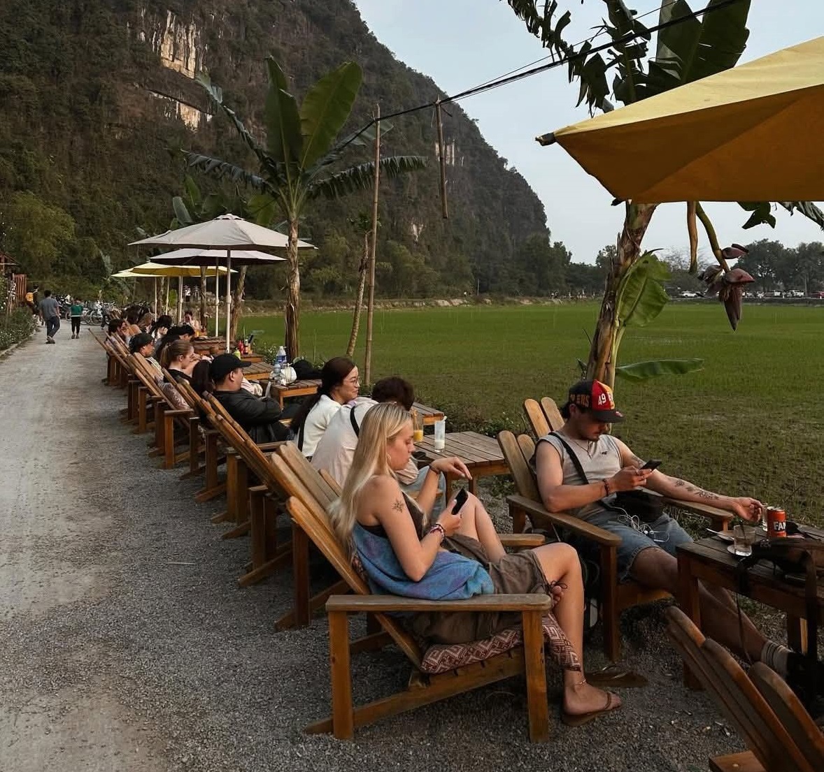 Open-air cafe near Bich Dong Pagoda Ninh Binh rice field view — Vietnam Unlock