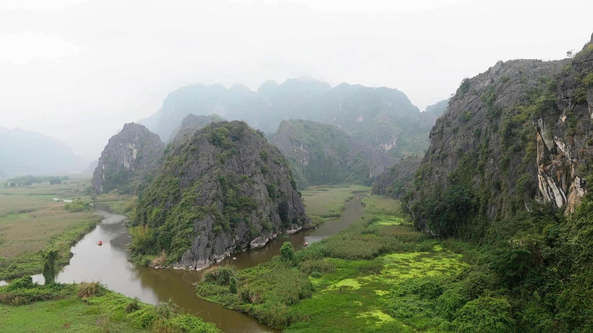 Van Long Nature Reserve Ninh Binh limestone karsts wetland boat — Vietnam Unlock