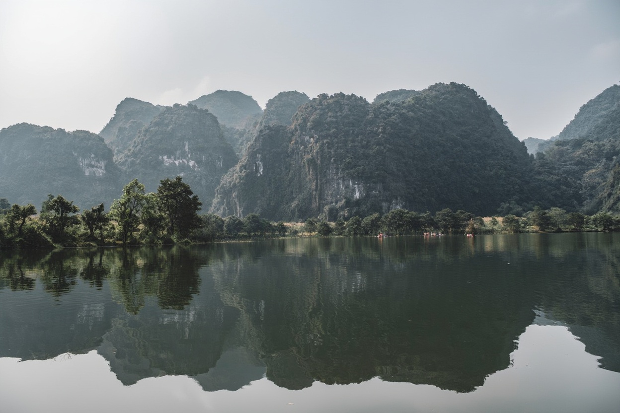 Ba Be Lake at dawn — 500 hectares of water with zero cruise ships on it