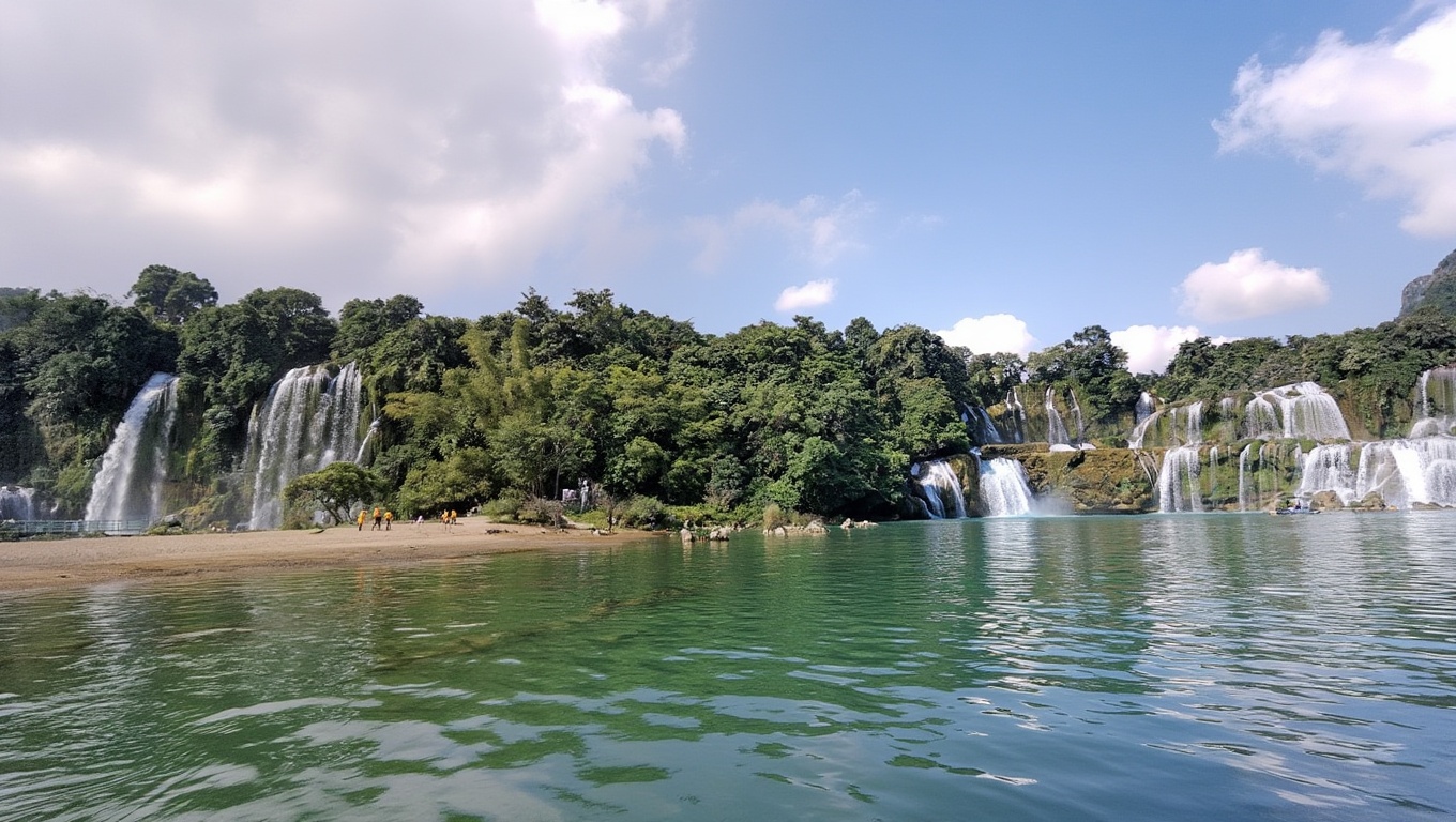 The border runs through the middle of the falls — Chinese infrastructure visible on the far bank