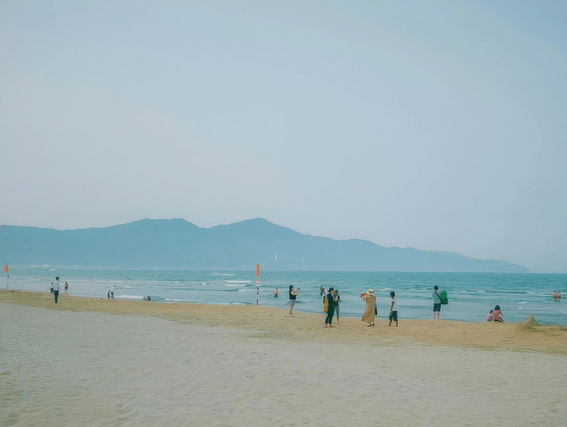 My Khe Beach — 30 km of coastline, the Marble Mountains visible to the south on a clear day