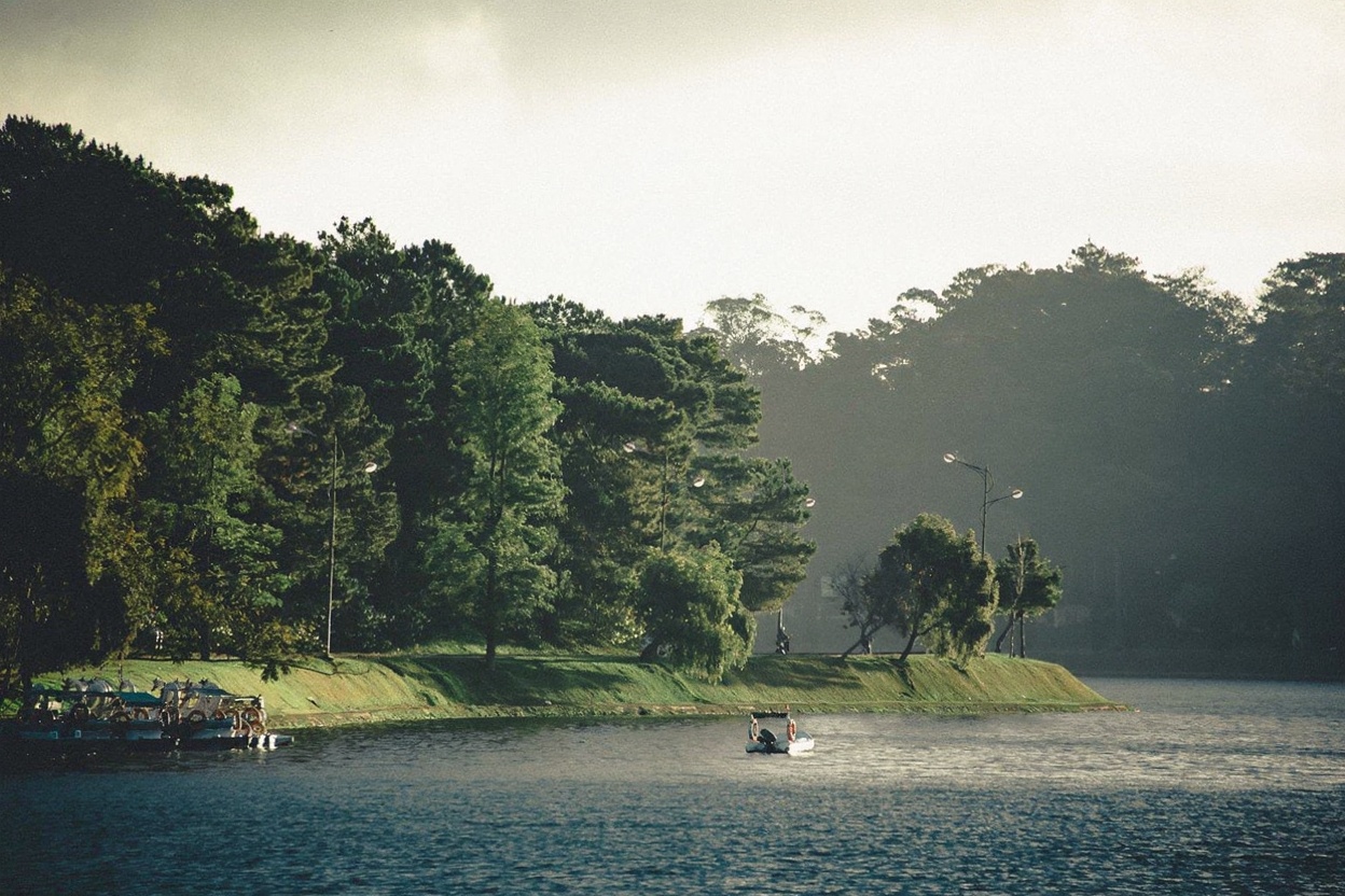 Xuan Huong Lake mid-morning — the paddle boats launch after 8am, the best time is before that