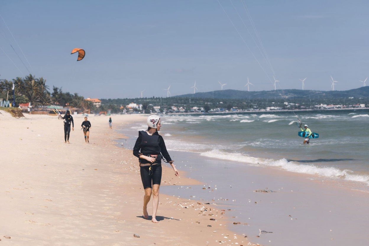 Mui Ne in the wet season — dramatic sky and green landscape, but the beach is not what you came for