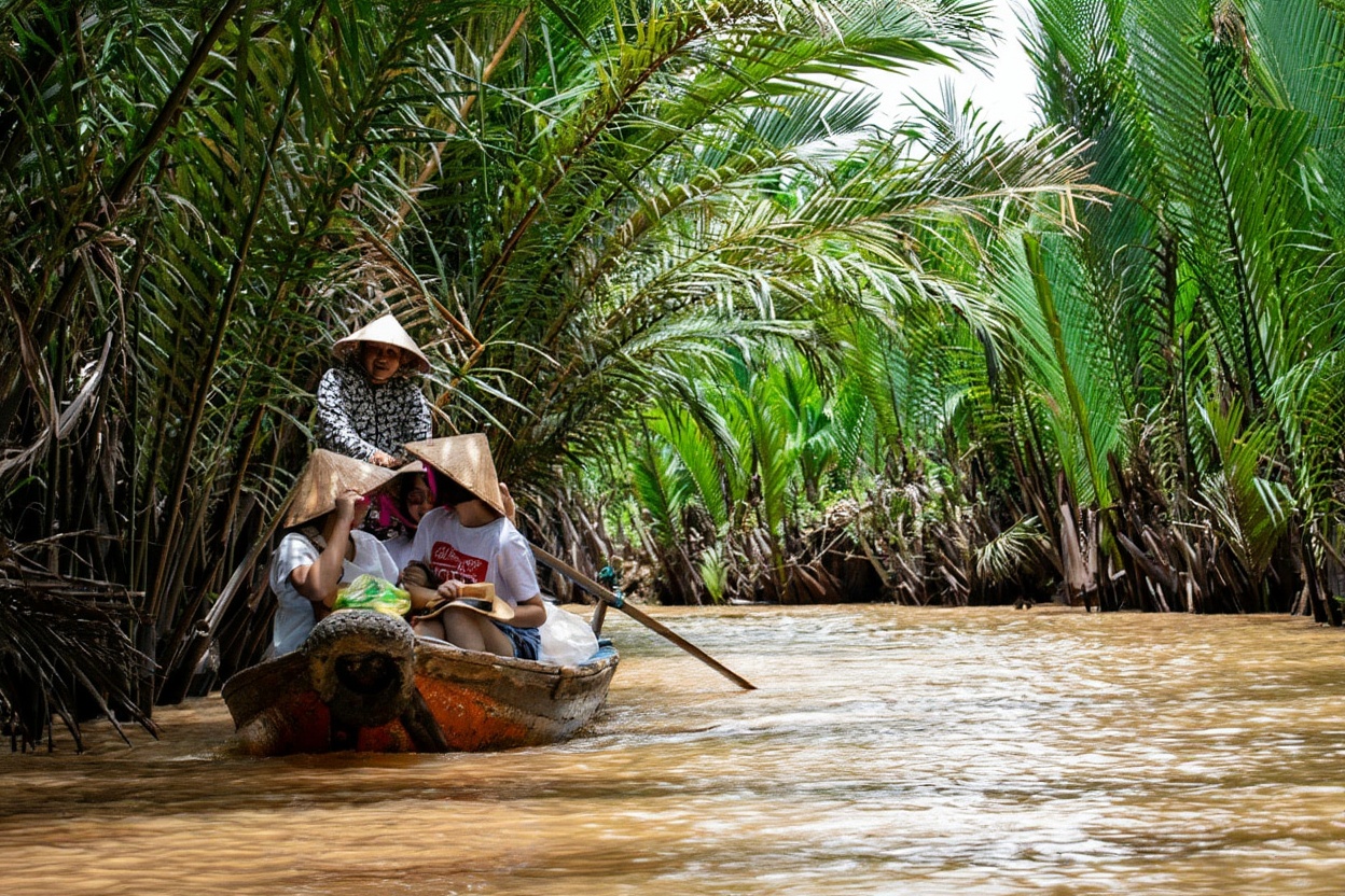 Narrow sampan channels in the Mekong Delta — you'll hear the water before you see it
