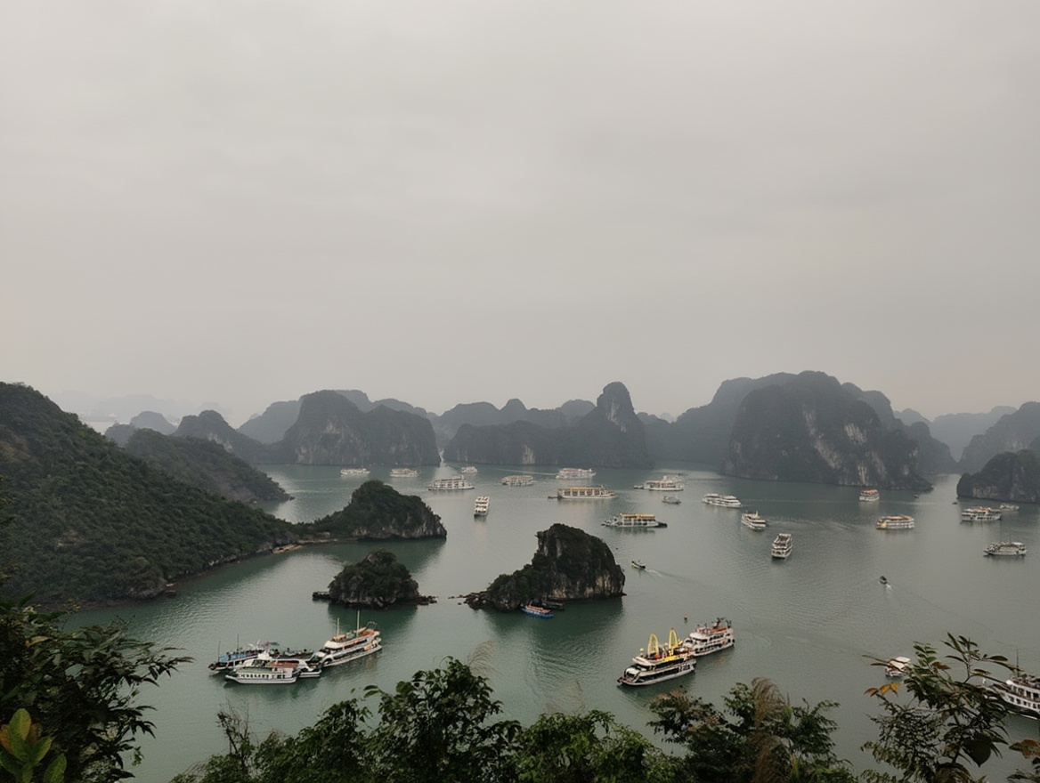 Ha Long Bay at dawn — the limestone karsts are the same at every price point. The boat isn't.