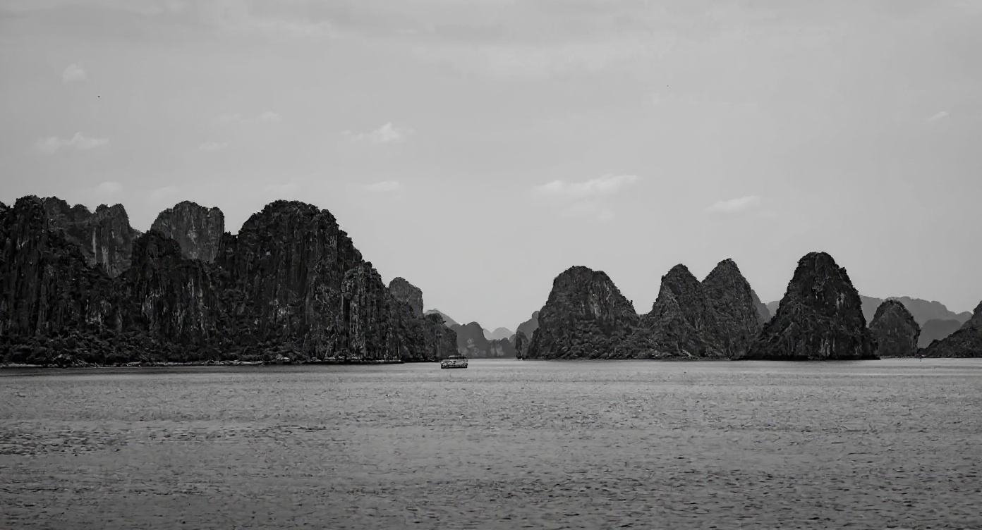 Ha Long Bay at dawn in autumn — the mist on the water earns its reputation