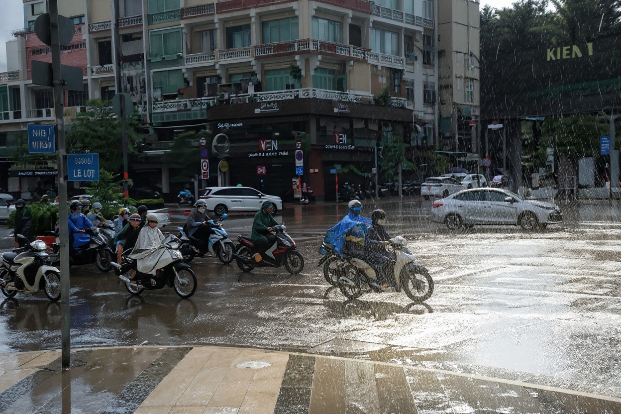 Saigon in rainy season — afternoon storm, streets drain within an hour